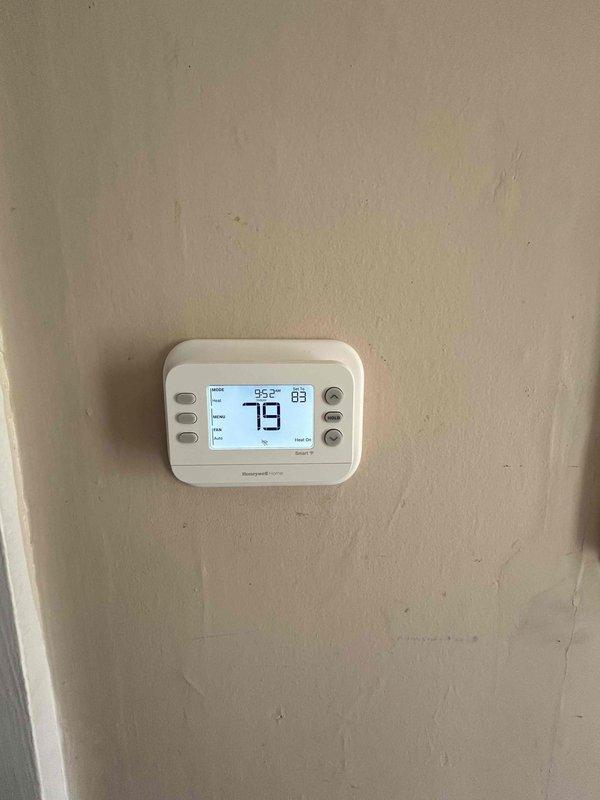 Completed annual care plan tune-up maintenance on gas furnace and air conditioning system with coil located in closet. Performed diagnostic testing of system operation, measured supply air temperature at ceiling register, and verified thermostat functionality showing current cooling setpoint. System operating within normal parameters at time of inspection.