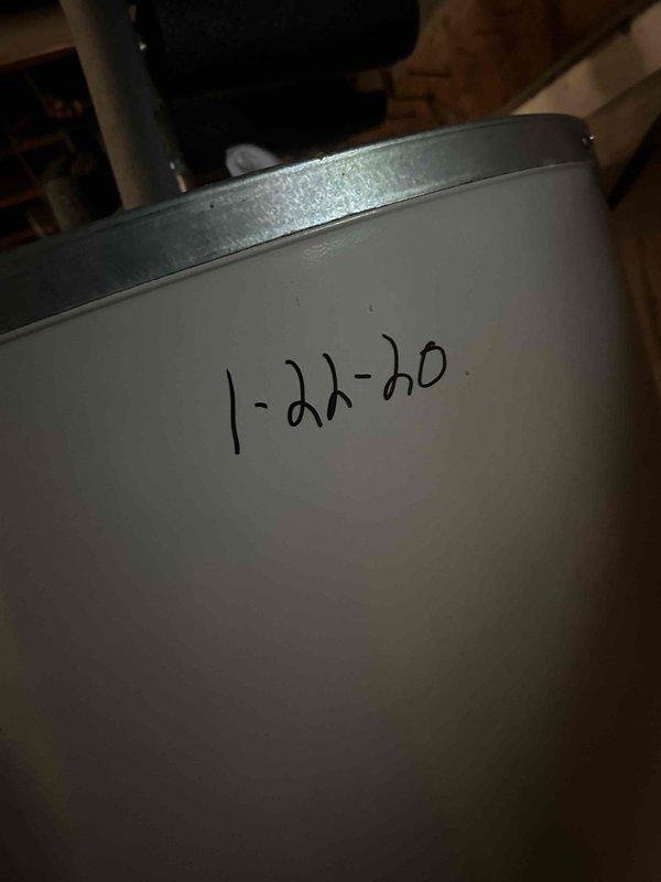 Performed preventative maintenance flush on tanked water heater, which was last serviced one year prior. Drained sediment buildup from tank bottom through drain valve, inspected all supply and discharge piping connections for leaks or corrosion, and verified proper operation of temperature and pressure relief valve. System refilled and returned to normal operation with no issues identified.