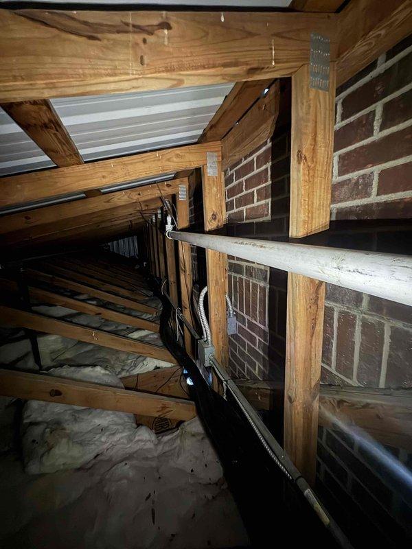 Successfully installed four 1:1 Friedrich heat pump systems to provide climate control for a patio bar area. Each system consists of a 2-ton wall-mounted indoor head unit with remote control paired with a 2-ton outdoor heat pump unit rated for operation down to 5 degrees. All four outdoor units were crane-lifted and positioned on the rooftop.

Installation included running refrigerant linesets from each outdoor unit through roof penetrations into the attic space and down to their respective indoor heads. Installed condensate pumps at each indoor unit with gravity drain lines tied into existing drainage system. Completed all electrical wiring between indoor and outdoor units, routing through attic space and utilizing existing roof penetrations. Applied linehide covering to all exposed lineset and wiring sections for aesthetic finish and protection.

Verified all refrigerant connections are secure and leak-free. Tested each system independently to confirm proper operation of heating and 