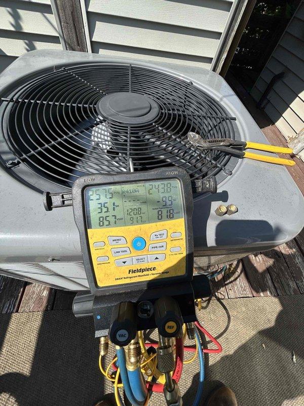 Performed routine maintenance on residential heat pump system installed approximately two years ago, located on rear deck with air handler in adjacent storage closet. Connected manifold gauges and Fieldpiece digital diagnostics meter to assess system performance, verifying refrigerant pressures, temperatures, and overall operational parameters. All measurements indicated proper system function with no deficiencies noted during inspection.