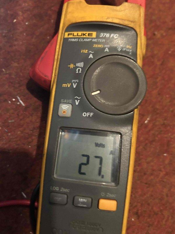 Replaced defective indoor blower motor under warranty and performed comprehensive system testing to verify proper operation. Electrical measurements confirmed correct voltage supply at 27 volts, and all system components were evaluated to ensure no additional issues were present following the motor replacement.