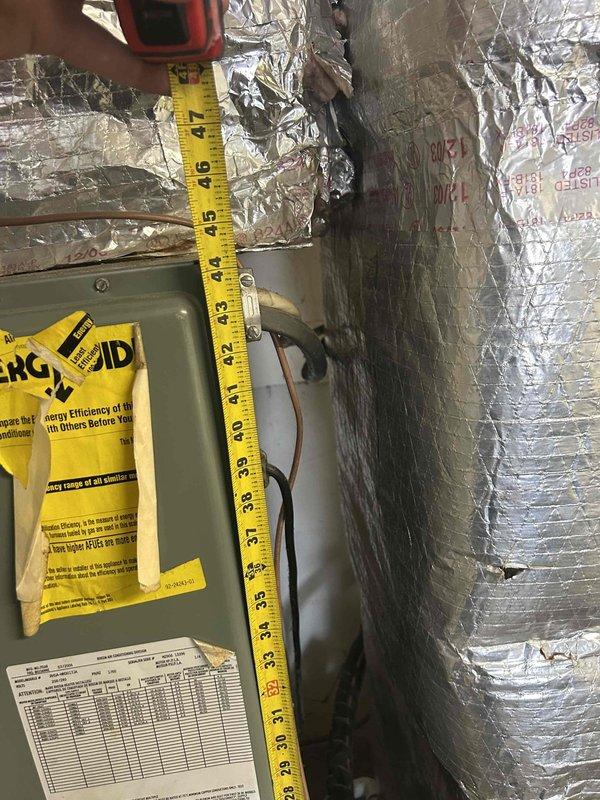 Responded to no cooling complaint on 9-year-old Rheem heat pump system (Model RGSA-HM5JTZA, manufactured 07/2006). System had recent TXV replacement and was unable to maintain setpoint with indoor temperature at 79°F despite thermostat set to 73°F. Performed diagnostic evaluation of refrigerant circuit and airflow components, documented system nameplate specifications and measured operating parameters to determine cause of insufficient cooling capacity.