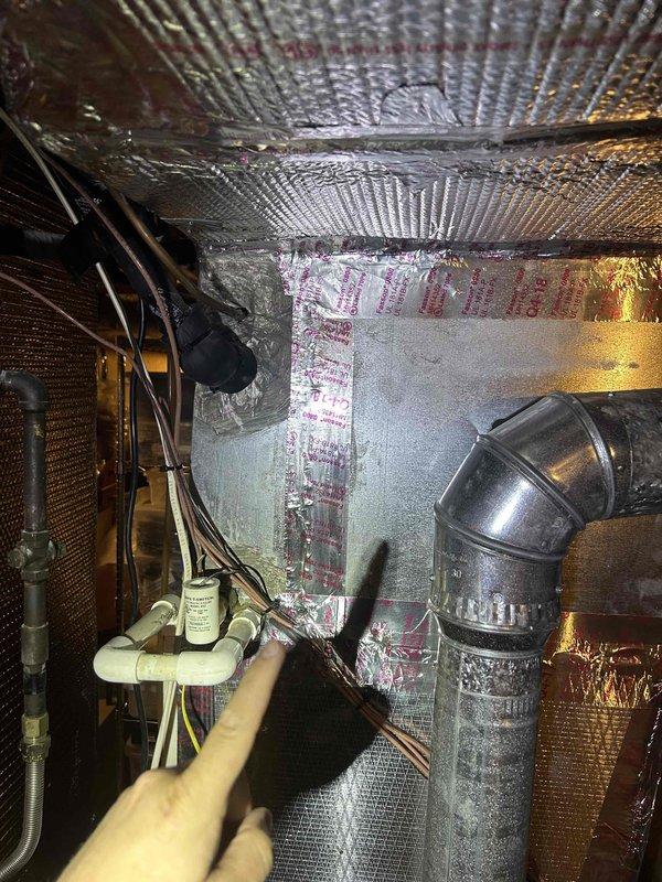 Completed comprehensive AC tune-up on 9-year-old residential heating and air conditioning system with no reported issues. Performed standard preventive maintenance including inspection of ductwork in crawlspace, verification of electrical connections at outdoor unit capacitor, and system performance testing. Replaced existing thermostat per customer request and confirmed all components operating within manufacturer specifications.