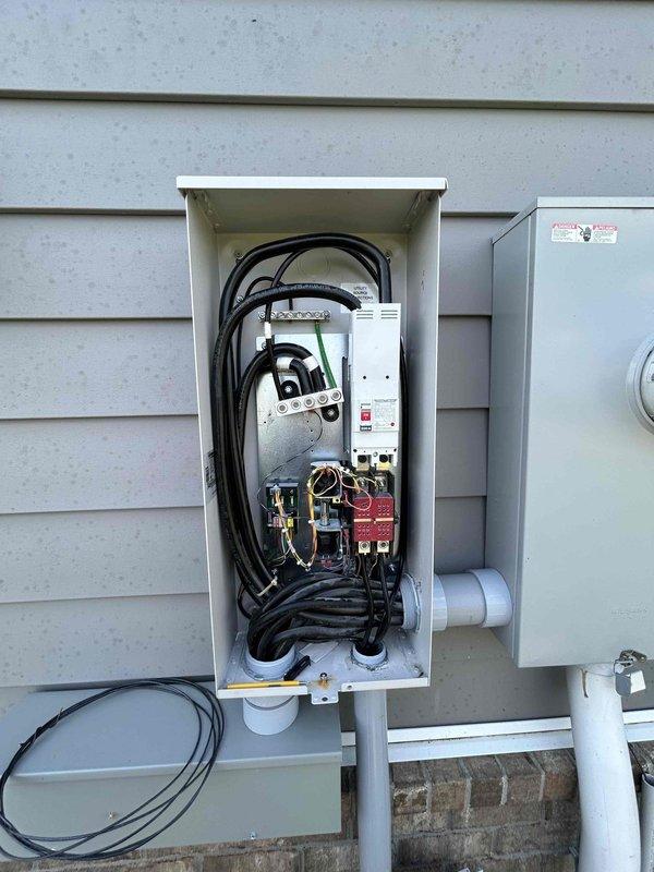 Completed new installation commissioning and full system verification for 26KW Generac next-generation standby generator. Performed comprehensive testing of all electrical connections, verified proper operation of transfer switch assembly with circuit breakers and contactors, confirmed correct installation of exterior service disconnect panel and metering equipment, and validated proper conduit routing and cable management throughout the installation. Inspected internal generator control components including wiring harnesses, circuit protection devices, and digital control unit to ensure compliance with manufacturer specifications. Registered unit and completed commissioning procedures, confirming system readiness for automatic operation during power outages.