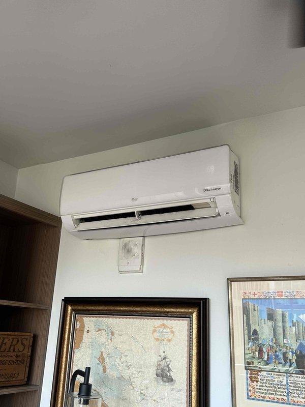 Responded to no cooling complaint on LG Dual Inverter ductless mini-split system in commercial space. Upon arrival, verified unit was operational but not maintaining desired temperature setpoint. Measured ambient room temperature at 76.6°F using calibrated digital thermometer. Inspected indoor wall-mounted air handler for proper airflow and operational status. System appeared to be running but not achieving adequate cooling capacity. Documented equipment condition and temperature readings for diagnostic evaluation.