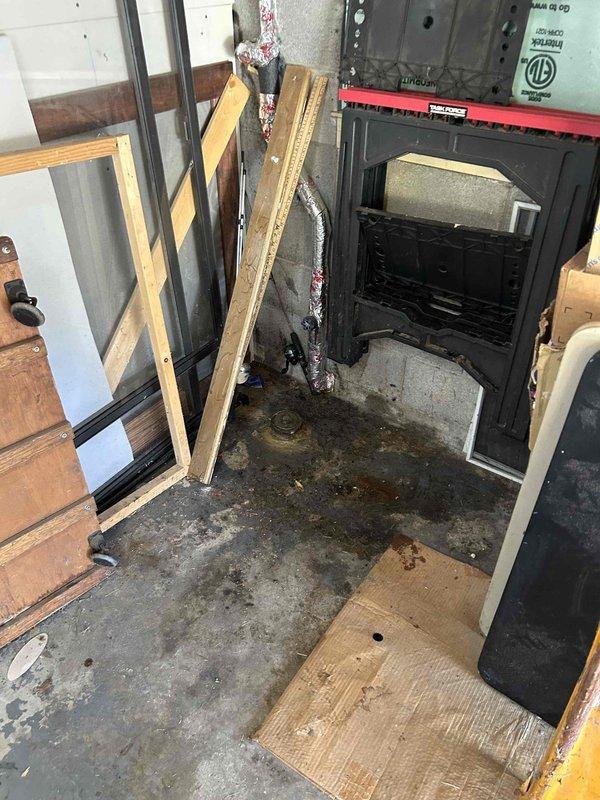 Responded to emergency call for sewage backup in basement bathroom where wastewater discharged from toilet onto floor during upstairs shower use. Upon arrival, assessed bathroom area affected by backup and identified potential main sewer line obstruction. Documented existing conditions including water damage to bathroom floor and placed temporary absorbent materials to contain affected area.