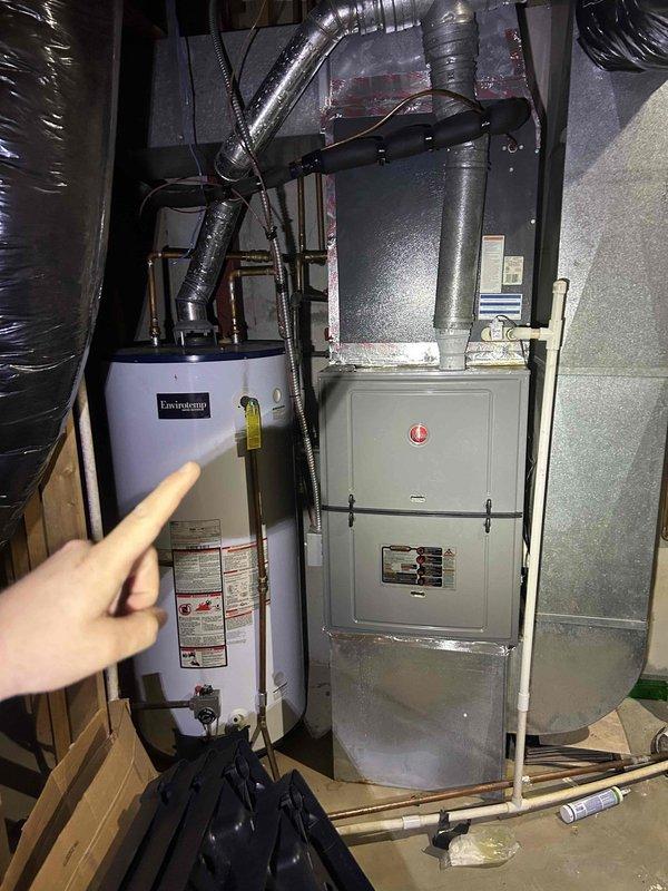 Completed Club Duo maintenance service on dual-zone HVAC system with heat pump equipment located in basement and attic areas. Performed comprehensive inspection and maintenance on Rheem furnace unit (Model N52011756A2UH/S1A5, manufactured 02/2023) and associated heat pump system. Replaced customer-provided air filters in specified sizes (30x20x1 and 12x12x1) at both equipment locations. Verified proper operation of all system components, inspected ductwork connections, and documented equipment specifications and serial numbers for service records.