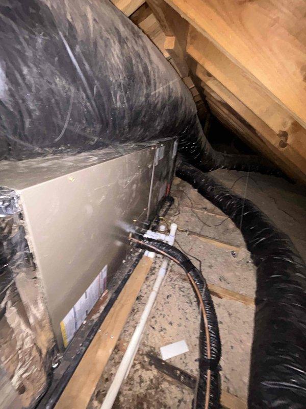 Coordinated with water damage restoration company to address moisture-damaged plywood subflooring beneath attic-mounted air handler unit. Disconnected and temporarily removed air handler from platform, removed compromised plywood decking, installed new plywood substrate, and reinstalled air handler to manufacturer specifications. Verified all ductwork connections, condensate lines, and electrical connections upon completion of reinstallation.