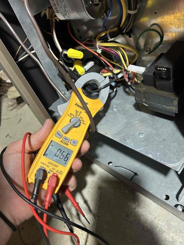Responded to no cooling complaint on residential HVAC system experiencing intermittent 4-hour pressure shutdown cycles. Performed diagnostic testing using pressure gauges and electrical meter to assess system operation and identify root cause of shutdown issue. Measured amperage draw at 0.66 amps on blower motor circuit and inspected capacitor, wiring connections, and control components within air handler cabinet. Evaluated refrigerant pressures and system performance to determine if pressure switch cycling was related to refrigerant charge, airflow restriction, or control malfunction. Discussed findings with homeowner regarding the intermittent pressure shutdown condition and reviewed previously recommended part replacement on older secondary unit to prevent future component failure.