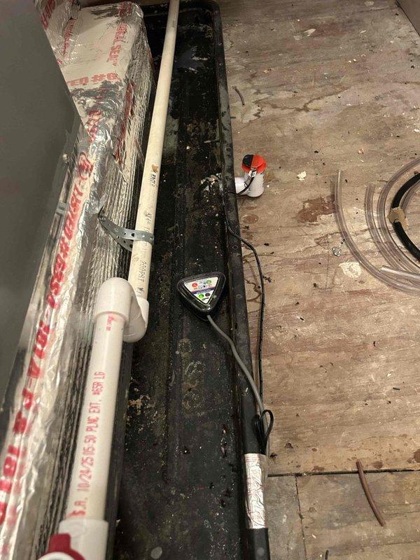 Responded to no cooling complaint on 10-11 year old geothermal system located in upstairs utility closet. Performed diagnostic evaluation of indoor air handler unit and documented current system conditions. Replaced dirty air filter that was restricting airflow to the system. Photographed equipment access area and filter replacement for service records.
