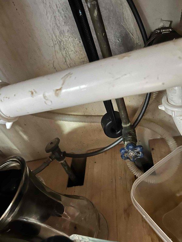 Accessed crawl space and successfully tapped into existing cold water supply line. Installed new copper water line running from connection point in crawl space through floor structure to kitchen area. Routed supply line to refrigerator location and connected to ice maker box behind appliance. Installed shut-off valve for dedicated ice maker supply line. Tested all connections for leaks and verified proper water flow to ice maker. All plumbing work completed to code with secure mounting and proper support throughout the run.