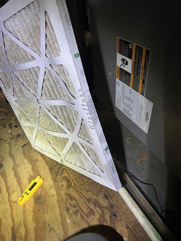 Responded to no-cooling call on 12-year-old Lennox system. Upon arrival, confirmed indoor blower operational but outdoor condensing unit not running with condenser fan blade stationary. Thermostat displayed 83°F actual temperature with 73°F setpoint, indicating 10-degree temperature differential. Inspected indoor air handler, verified clean air filter in place and proper airflow. Checked electrical connections at thermostat showing proper cool mode command signal. Diagnosed failed outdoor unit with non-operational compressor and condenser fan, likely due to capacitor failure or compressor lockout on aging system beyond typical service life expectancy.