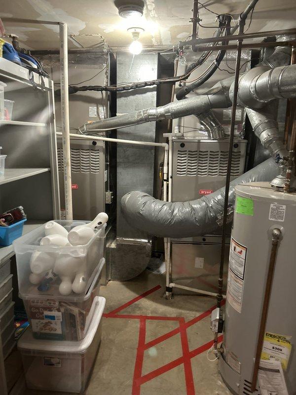 Responded to service call regarding suspected mold growth in ventilation system. Upon inspection, discovered heavily soiled deck vent with significant accumulation of dirt, dust, and debris rather than mold contamination. Inspected basement mechanical room containing dual furnace units, ductwork, and associated HVAC components; found no evidence of mold growth throughout the system or in connected ductwork and vents, confirming issue was isolated to single exterior deck vent opening with normal environmental debris buildup.
