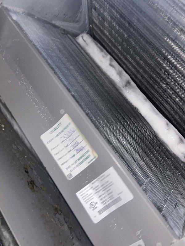 Responded to callback for rising indoor temperatures following previous plenum reinstallation work. Upon arrival, homeowner reported hearing a loud popping sound the night before, with indoor temperature climbing into the 80s. Inspected evaporator coil and air handling system components for potential issues related to the reported noise and loss of cooling capacity. Documented current condition of heat exchanger coils and surrounding ductwork with photographic evidence showing operational equipment with normal wear patterns and minor dust accumulation on finned surfaces.