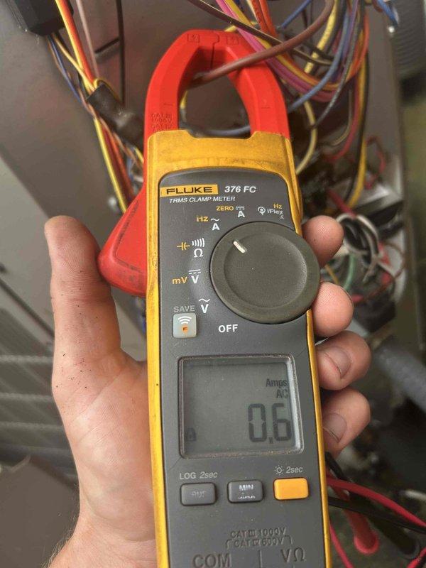 Completed preventative maintenance tune-up on basement Lennox air conditioning system as part of membership benefits. Performed comprehensive system inspection including electrical measurements using clamp meter to verify proper amperage draw and component function. All systems operating within normal parameters with no issues identified.