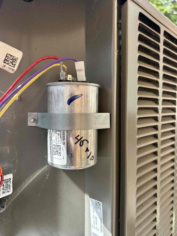 Completed Club Single maintenance on gas furnace and air conditioning system. Performed standard inspection of furnace unit in basement, verified capacitor specifications at 45 microfarads, and documented equipment condition with photos. System operational with no deficiencies noted during visit.