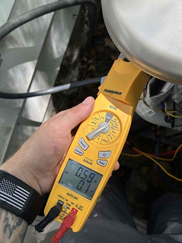 Completed Gold Level prepaid maintenance on single-system AC/GF unit located in basement. Addressed previous sensor issue where water backup valve had tripped; verified valve operation, cleared backup, and replaced 20x25x4 filter supplied by customer. Performed diagnostic testing with digital multimeter, confirming proper electrical readings and system functionality across all components.