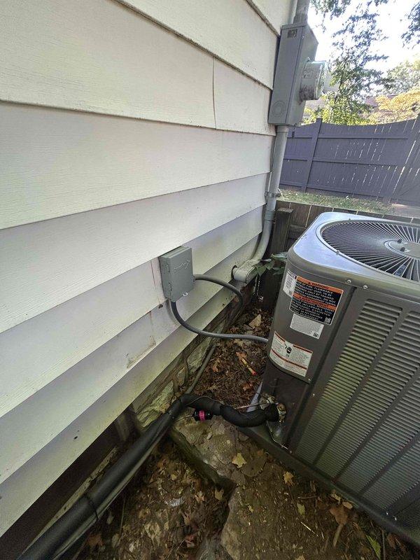 Completed warranty replacement of outdoor condensing unit requiring two-man lift over privacy fencing to access narrow side yard installation location. Replaced failed ODU with new Lennox equipment, uploaded equipment tags and documentation for warranty claim processing. Installed new filter drier, thoroughly purged line set and evaporator coil with nitrogen to remove contaminants and moisture. Maintained nitrogen flow during all brazing operations to prevent oxidation and ensure clean refrigerant circuit. Verified proper unit leveling and secure placement on existing pad. Confirmed electrical connections at disconnect box, tested system operation, and ensured all refrigerant lines were properly insulated and secured.