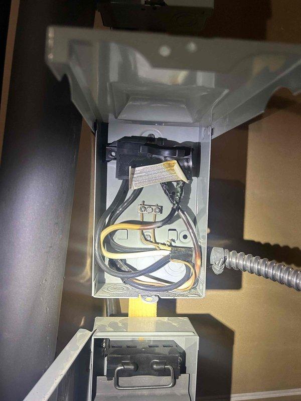 Responded to callback for generator issue causing geothermal HVAC unit failure during power outage. Assessed generator capacity and load requirements, confirming undersized generator unable to support geo unit startup amperage draw. Inspected electrical panel connections, transfer switch operation, and generator governor settings. Verified all wiring connections at disconnect box and junction box serving geothermal system are secure and properly terminated. Documented electrical configuration with photos showing control wiring, terminal connections, and conduit routing. Provided assessment that generator requires upsizing to handle geothermal unit's inrush current demands. Also evaluated kitchen lighting circuits for future quote as requested.