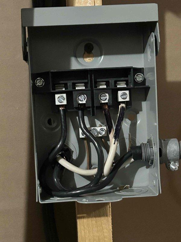 Responded to callback for generator issue causing geothermal HVAC unit failure during power outage. Assessed generator capacity and load requirements, confirming undersized generator unable to support geo unit startup amperage draw. Inspected electrical panel connections, transfer switch operation, and generator governor settings. Verified all wiring connections at disconnect box and junction box serving geothermal system are secure and properly terminated. Documented electrical configuration with photos showing control wiring, terminal connections, and conduit routing. Provided assessment that generator requires upsizing to handle geothermal unit's inrush current demands. Also evaluated kitchen lighting circuits for future quote as requested.