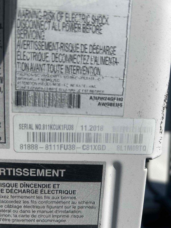 Responded to no-cool call on 7-year-old electric air conditioning system serving third floor space. Unit was displaying CH21/CH35 error codes and not operating. Performed diagnostic testing on ceiling-mounted air handler, documented equipment nameplate information showing manufacture date of November 2010, and measured resistance readings of 56.3 ohms during electrical component testing to isolate fault condition.