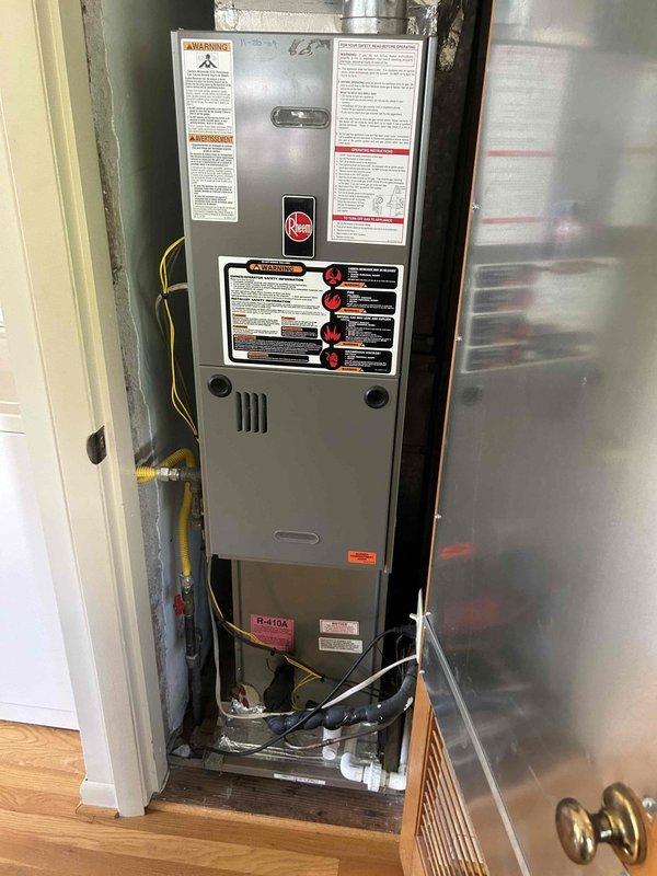 # No Cooling - 15+ Year Old System

Responded to no cooling call for residential air conditioning system over 15 years old affecting entire home. Upon inspection, discovered failed control wiring with significant age-related deterioration, including degraded insulation and compromised connections. Replaced damaged low-voltage wiring bundle to restore proper communication between thermostat and outdoor condensing unit. Verified furnace air handler operation and confirmed all electrical connections secured. System restored to full cooling operation with proper airflow throughout residence.