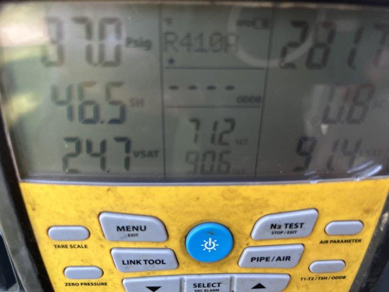 Responded to no cooling complaint on gas furnace system with basement-located air handler experiencing repeated coil freeze-ups. Unit had frozen approximately three weeks prior with temporary resolution after filter replacement, but freezing recurred within 24 hours of restart. Upon arrival, system was off and thawing. Performed comprehensive diagnostic evaluation using digital manifold gauge set to measure R-410A refrigerant pressures and temperatures across the system. Recorded suction line temperature of 46.5°F, liquid line temperature of 24.7°F, and superheat reading of 7.12°F with ambient conditions at 90.6°F. Low superheat measurement indicated potential refrigerant overcharge or restriction in the system. Inspected evaporator coil access, condensate drain lines, and PVC drainage system for blockages or improper flow. Evaluated airflow across indoor coil and verified filter condition. Checked blower motor operation and static pressure readings to rule out airflow restrictions as 