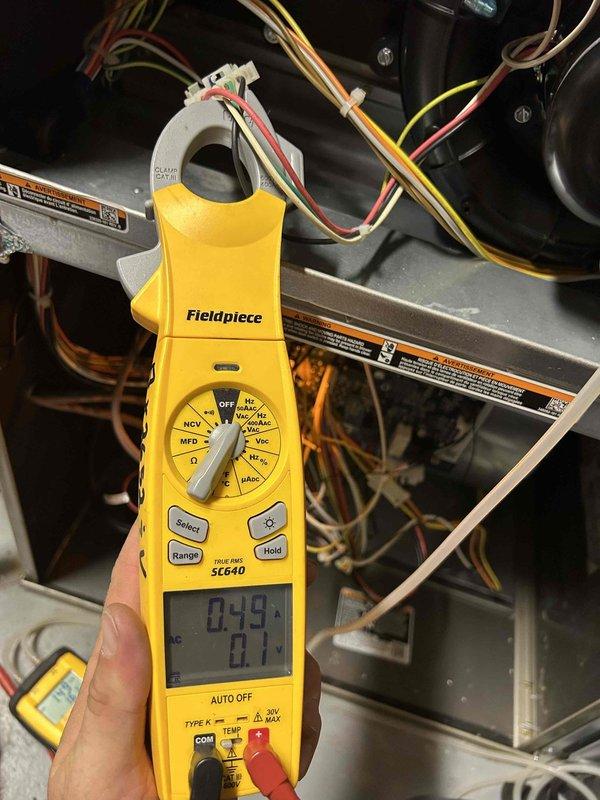 Completed annual Care Plan tune-up on basement gas furnace and air conditioning system with coil. Performed comprehensive system inspection including electrical testing of contactor and dual-run capacitor (45/5µF, 440VAC), verified proper amperage draws using clamp meter with readings within normal operating parameters. System operating efficiently with all components functioning as designed.