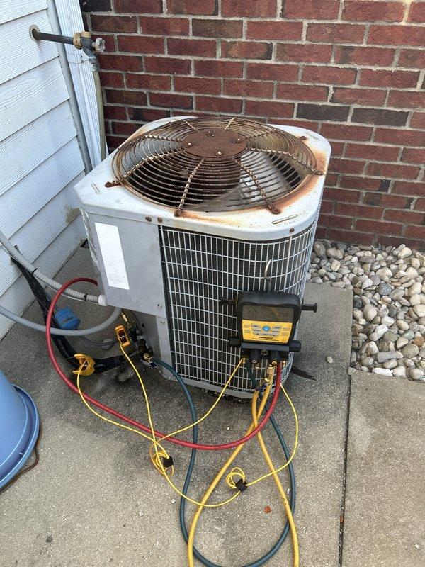 Completed comprehensive Care Plan tune-up service on air conditioning and gas furnace system located in basement. Performed full system diagnostics on outdoor condensing unit including pressure and temperature readings using manifold gauges, inspected condenser coils and fan operation, and evaluated overall unit condition. Accessed indoor gas furnace, inspected blower motor assembly and electrical connections, verified proper airflow through system with customer-supplied 16x25x1 filter, and confirmed all mechanical components operating within manufacturer specifications.