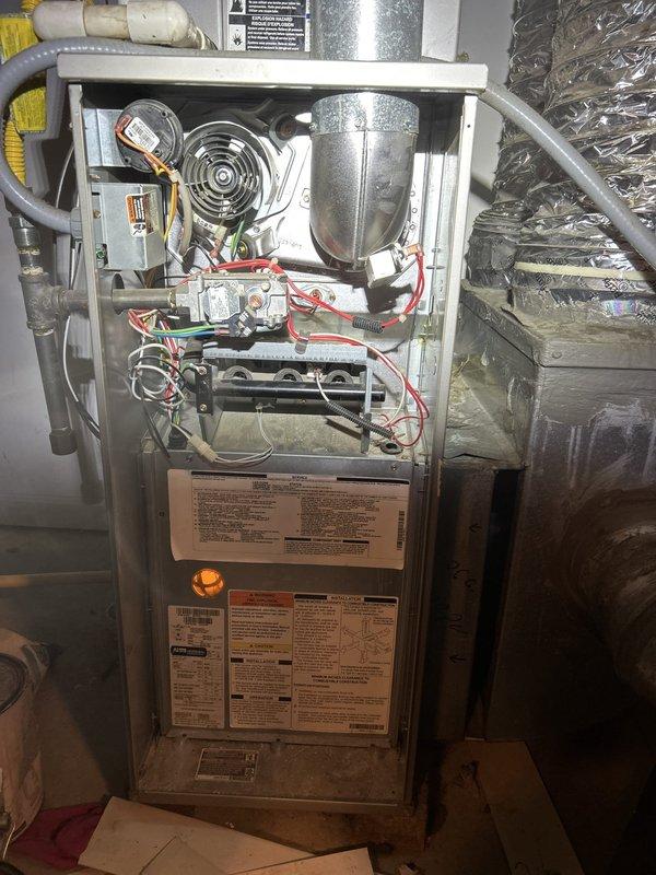 Completed comprehensive Care Plan tune-up service on air conditioning and gas furnace system located in basement. Performed full system diagnostics on outdoor condensing unit including pressure and temperature readings using manifold gauges, inspected condenser coils and fan operation, and evaluated overall unit condition. Accessed indoor gas furnace, inspected blower motor assembly and electrical connections, verified proper airflow through system with customer-supplied 16x25x1 filter, and confirmed all mechanical components operating within manufacturer specifications.