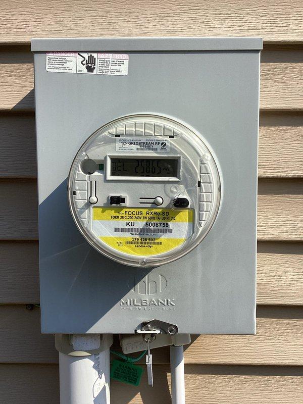 Conducted comprehensive electrical system evaluation for propane generator integration and circuit breaker panel assessment. Customer reported ongoing issues with power surges causing circuit breakers to trip repeatedly. Performed thorough inspection of existing main electrical panel and exterior meter assembly to diagnose surge-related problems and determine system capacity for generator installation. Documented current panel configuration, breaker layout, wire routing, and meter specifications. Provided detailed estimate for propane-fueled standby generator installation including required electrical connections, transfer switch integration, and necessary panel upgrades to resolve power surge issues and ensure reliable backup power operation.