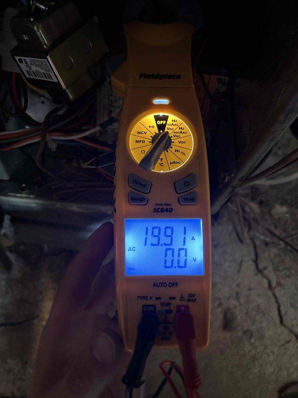 Completed Gold Level preventive maintenance on heat pump and air handler system located in crawlspace. Inspected evaporator coil and observed moderate dust and dirt accumulation on fins with some minor surface oxidation present. Measured system amperage at 19.91 amps with multimeter to verify proper operation. Customer provided 20x20x2 filter for installation during service visit. System operational upon completion of maintenance procedures.
