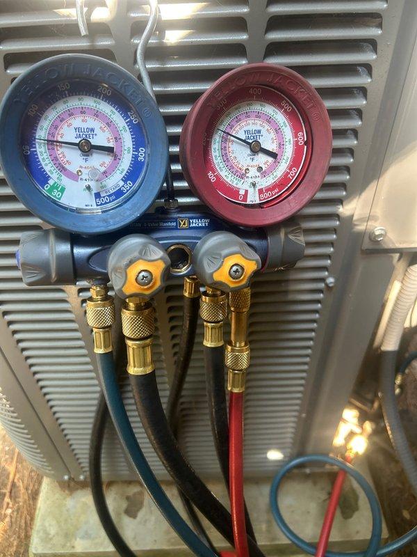 Responded to no cooling complaint with upstairs temperature reading 86°F. Connected manifold gauge set to measure system pressures and diagnose refrigerant circuit performance. Based on gauge readings and warm air discharge from supply vents, identified refrigerant-related issue affecting cooling capacity and completed necessary diagnostics to determine appropriate corrective action.