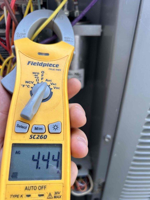 Completed comprehensive Care Plan tune-up on ground floor air conditioning unit located in AC closet. Performed standard maintenance procedures including system inspection, electrical diagnostics using clamp meter to verify proper amperage draw on circuit conductors, and evaluation of electrical panel connections. All system components operating within normal parameters at time of service.