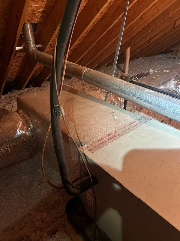 Responded to no-cool condition on upstairs zone with 15-year-old electric air conditioning system. Attic-mounted air handler was evaluated along with associated ductwork, refrigerant lines, and condensate drainage system. Due to system age and condition, provided comprehensive replacement estimate for complete HVAC system upgrade to restore cooling capacity and improve energy efficiency.