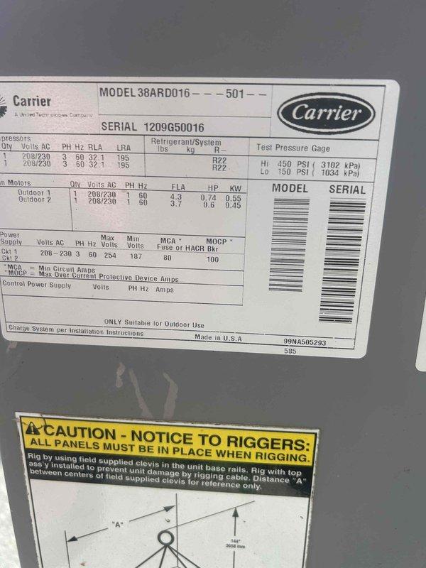 Responded to no cooling call on 9-year-old Carrier commercial AC unit serving sanctuary space. Found thermostat blank with unit completely off for approximately one day. Inspected Carrier model 38ARD016 outdoor condensing unit and indoor air handler with belt-driven blower assembly. Diagnosed loss of power to system, traced electrical issue, and restored power to thermostat and HVAC equipment. Verified blower motor operation, belt condition, and proper system startup. Unit returned to normal cooling operation with thermostat functioning properly.