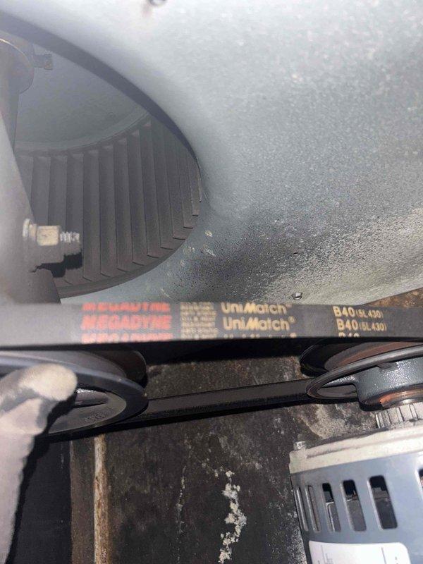 Responded to no cooling call on 9-year-old Carrier commercial AC unit serving sanctuary space. Found thermostat blank with unit completely off for approximately one day. Inspected Carrier model 38ARD016 outdoor condensing unit and indoor air handler with belt-driven blower assembly. Diagnosed loss of power to system, traced electrical issue, and restored power to thermostat and HVAC equipment. Verified blower motor operation, belt condition, and proper system startup. Unit returned to normal cooling operation with thermostat functioning properly.