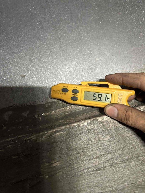 Responded to no cooling complaint on 6-year-old electric HVAC system unable to maintain temperature below 77°F. Performed diagnostic evaluation of indoor unit located in back of home. Temperature measurements revealed supply air at 59°F and return air at 75.2°F, indicating a 16.2°F temperature split, which falls below the standard 18-22°F range for proper cooling operation. System requires further evaluation of refrigerant charge, airflow restrictions, or potential compressor efficiency issues to restore adequate cooling capacity.