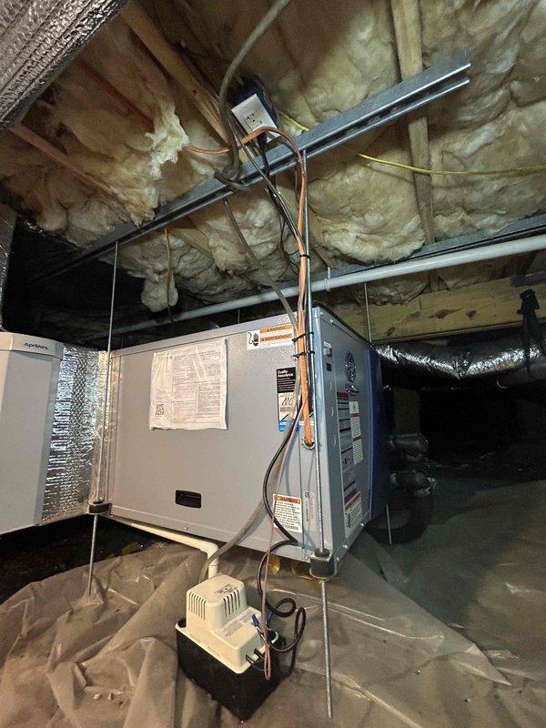 Responded to callback for loud operational noise on recently installed HVAC system. Upon arrival, performed comprehensive inspection of air handler, furnace, and associated ductwork in basement mechanical area. Investigated noise complaint by running system through complete heating and cooling cycles while monitoring all components. Inspected mounting hardware, refrigerant lines, ductwork connections, and condensate pump assembly for loose fittings, vibration issues, or installation defects. Verified proper securing of copper refrigerant lines and mounting brackets. Checked air handler blower assembly and motor mounts for potential sources of noise transmission. Examined flexible ductwork connections and metal duct supports for resonance issues. All equipment found to be properly installed with secure mounting and appropriate vibration isolation. System operating within normal parameters with no abnormal sounds detected during inspection.