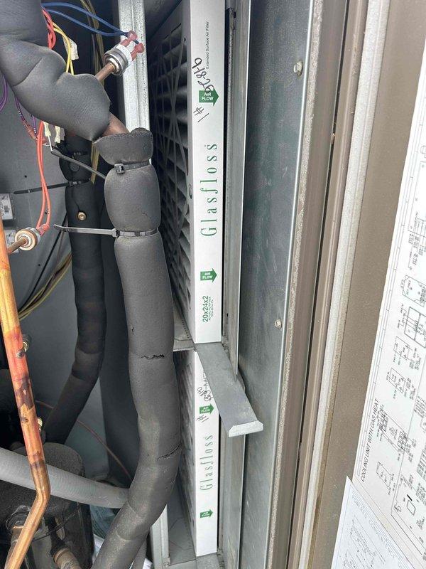 Completed scheduled maintenance visit on three commercial rooftop units (RTU 1 - front left, RTU 2 - front right, RTU 3 - back storeroom) as part of planned service agreement. Performed comprehensive inspection of all units, replaced air filters with (4) 16x24x2 and (8) 20x24x2 filters as specified, and verified proper airflow direction during installation. Noted belts A51 and A54 are on will call for annual replacement, documented equipment tag information and current operating conditions with photographs, and completed required maintenance forms with onsite manager sign-off.