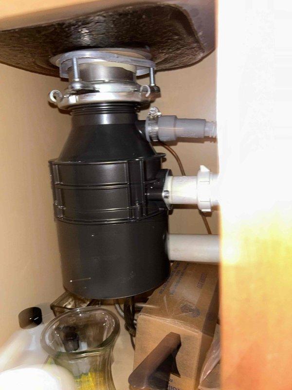 Completed routine plumbing inspection as part of preventative service agreement. Inspected kitchen sink plumbing system including garbage disposal unit, mounting assembly, discharge connections, and drain lines for proper operation and potential leaks. Evaluated bathroom sink faucet assembly and tested water flow to verify proper function of hot and cold water supply lines and fixture operation. All components found to be functioning within normal parameters with no immediate repairs required.