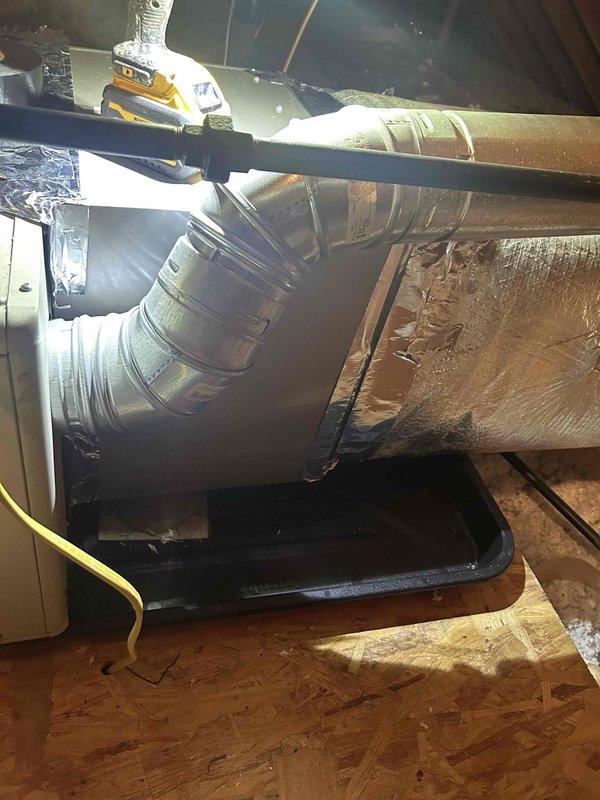 Completed full residential HVAC system installation consisting of a Bryant 2-ton 14.3 SEER2 single-stage air conditioning unit (model GA5SAN52400A) with matching evaporator coil (model CVAMA2417XMA). Removed and properly disposed of existing equipment per code requirements.

Installed outdoor condensing unit on new concrete pad in side yard area with refrigerant lines routed up exterior brick wall using proper mounting brackets and insulation. Installed electrical disconnect box on exterior wall and connected unit with electrical whip kit. Applied insulation to all refrigerant lines and installed refrigerant line filter drier for system protection.

In attic space, installed evaporator coil with proper transitions to existing ductwork using insulated flexible duct connections. Installed black drain pan beneath coil assembly to catch condensation. Integrated SS2 coil drain safety water sensor for overflow protection. Secured all ductwork connections with metallic tape and verified prope