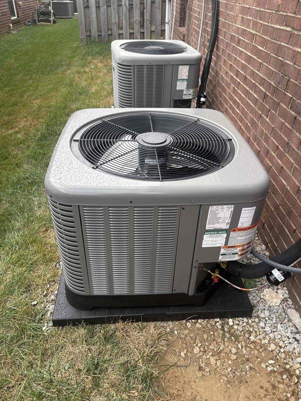 Completed full HVAC system installation for first floor residential application including RUUD 75K BTU 80% gas furnace (model R801T0754A17UHSNAS), RUUD 2.5 ton evaporator coil (model RCFY3617STANMC), and RUUD 2.5 ton 14.3 SEER2 air conditioning condenser unit (model RA14AY30AJ1NALHP). Removed and disposed of existing equipment, installed new outdoor unit on concrete pad with electrical disconnect box and whip kit, ran insulated refrigerant lines with filter drier, installed evaporator coil with transition to existing ductwork, and added SS2 coil drain safety water sensor. Obtained applicable permits, tested all system operations for proper functionality, and established care plan coverage for newly installed first floor system.