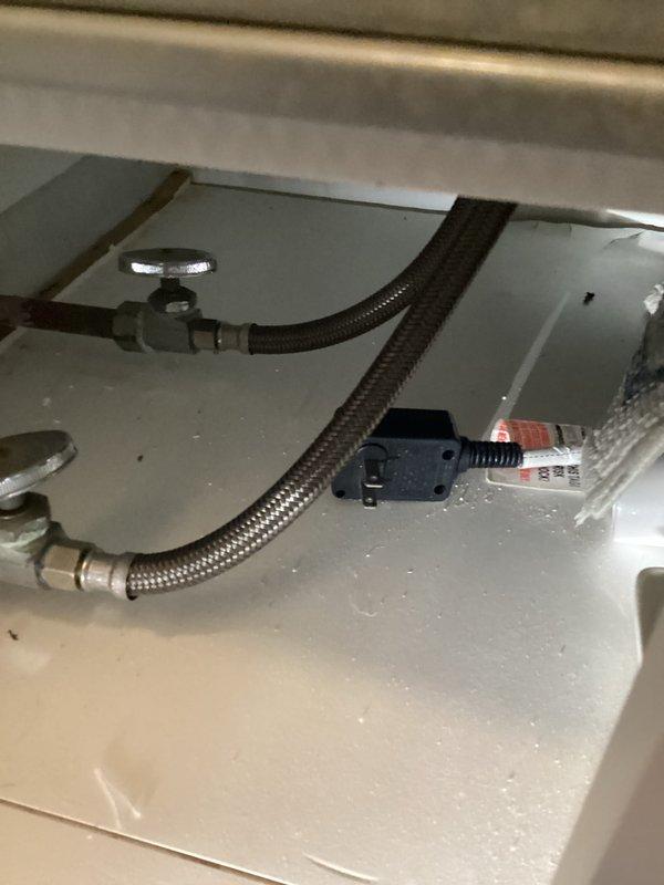 Completed comprehensive plumbing inspection of under-sink fixtures and drainage system. Examined supply line connections, shut-off valves, flexible hoses, PVC drain assembly with threaded fittings, and verified proper installation of all plumbing components with no leaks or deficiencies observed at time of inspection.