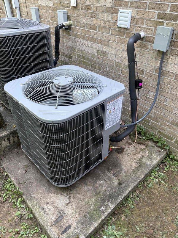 Completed full residential HVAC system installation featuring a Bryant Sentry Series 1.5 ton heat pump system with 14.3 SEER2 single stage outdoor unit (model GH5SAN51800A), indoor air handler (model FJ5ANXA18L00), and 10KW auxiliary heat kit. Removed and disposed of existing equipment per code compliance requirements. Installed outdoor condenser unit on concrete pad with snow legs, electrical disconnect box, and electrical whip connection. Mounted air handler with transition to existing ductwork and standard-sized air filter rack. Installed insulated refrigerant lines with refrigerant line filter connecting outdoor and indoor components. Added comprehensive drain safety system including trap, SS2 coil drain safety water sensor, and "Ceiling Saver" overflow drain pan with water sensor for secondary protection. Completed all electrical connections and secured refrigerant lines to exterior wall with mounting brackets. Installed digital thermostat for system control. Obtained applicable p