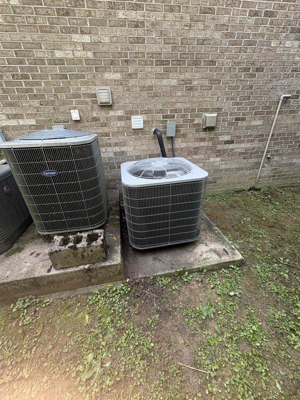 Completed full residential HVAC system installation featuring a Bryant Sentry Series 1.5 ton heat pump system with 14.3 SEER2 single stage outdoor unit (model GH5SAN51800A), indoor air handler (model FJ5ANXA18L00), and 10KW auxiliary heat kit. Removed and disposed of existing equipment per code compliance requirements. Installed outdoor condenser unit on concrete pad with snow legs, electrical disconnect box, and electrical whip connection. Mounted air handler with transition to existing ductwork and standard-sized air filter rack. Installed insulated refrigerant lines with refrigerant line filter connecting outdoor and indoor components. Added comprehensive drain safety system including trap, SS2 coil drain safety water sensor, and "Ceiling Saver" overflow drain pan with water sensor for secondary protection. Completed all electrical connections and secured refrigerant lines to exterior wall with mounting brackets. Installed digital thermostat for system control. Obtained applicable p