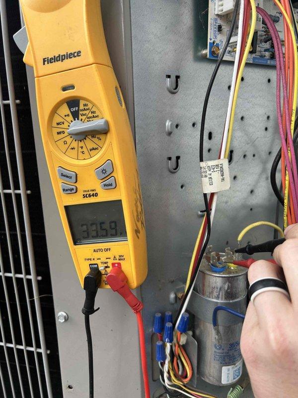Completed Care Plan tune-up on heat pump and air handler system located in closet. Performed comprehensive electrical diagnostics using clamp meter, recording voltage readings of 495.8V and 335.9V at control panel terminals. Inspected and tested capacitor, verifying proper electrical connections and system operation. Evaluated all wiring connections at terminal blocks and control board. Customer provided filters (16x20x1) as previously arranged. System operating within normal parameters upon completion of maintenance service.