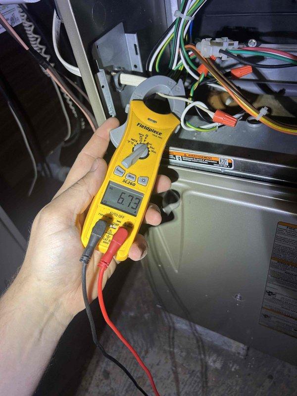 Completed seasonal air conditioning tune-up and maintenance service on a 2017 Carrier system utilizing R-410A refrigerant. Performed comprehensive system evaluation including airflow verification, electrical measurements showing 6.13 amp draw, subcooling assessment, and replaced 16x25x1 air filter per care plan maintenance protocol.
