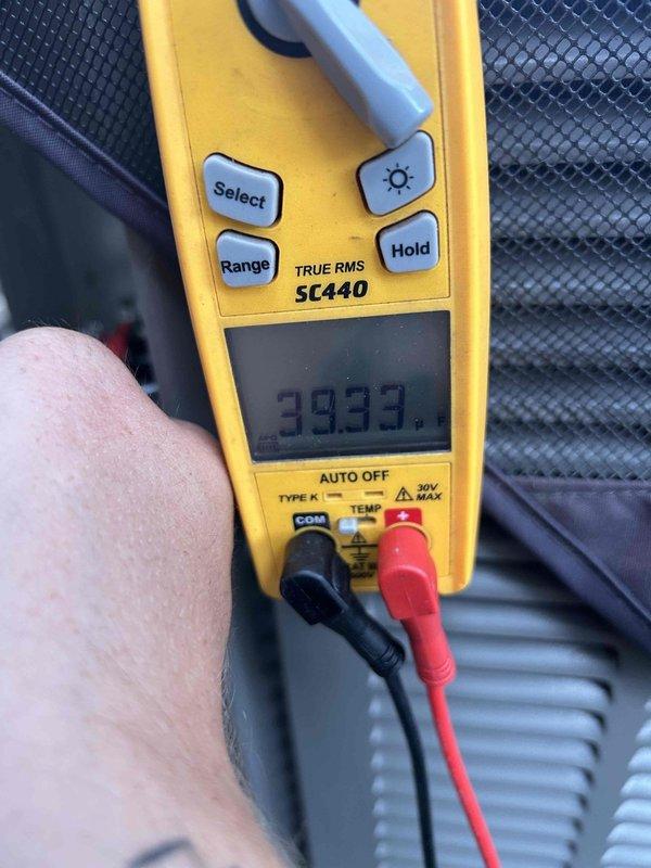 Completed preventive maintenance tune-up on air conditioning and gas furnace system located in basement. Performed comprehensive system diagnostics using calibrated test equipment, recording voltage readings of 39.33V and capacitance measurement of 4342 MFD to verify proper electrical component operation. Inspected all electrical connections, tested system controls, and evaluated overall equipment performance to ensure optimal efficiency and reliability for continued operation.