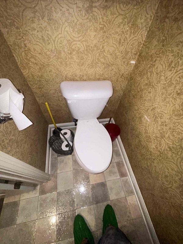 Responded to service call for toilet experiencing intermittent overflow issues, slow refill rates, and incomplete tank filling. Upon inspection, removed tank lid and diagnosed faulty fill valve and float assembly causing improper water level regulation. Adjusted float mechanism and tested flush cycle to verify proper refill timing and water level. Confirmed toilet now operates within normal parameters with complete tank refill and no overflow conditions.